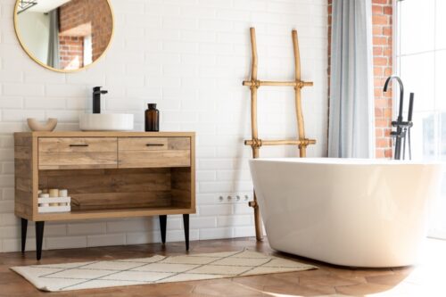 Loft,modern,style,bathroom.,free,standing,bath,and,black,faucet